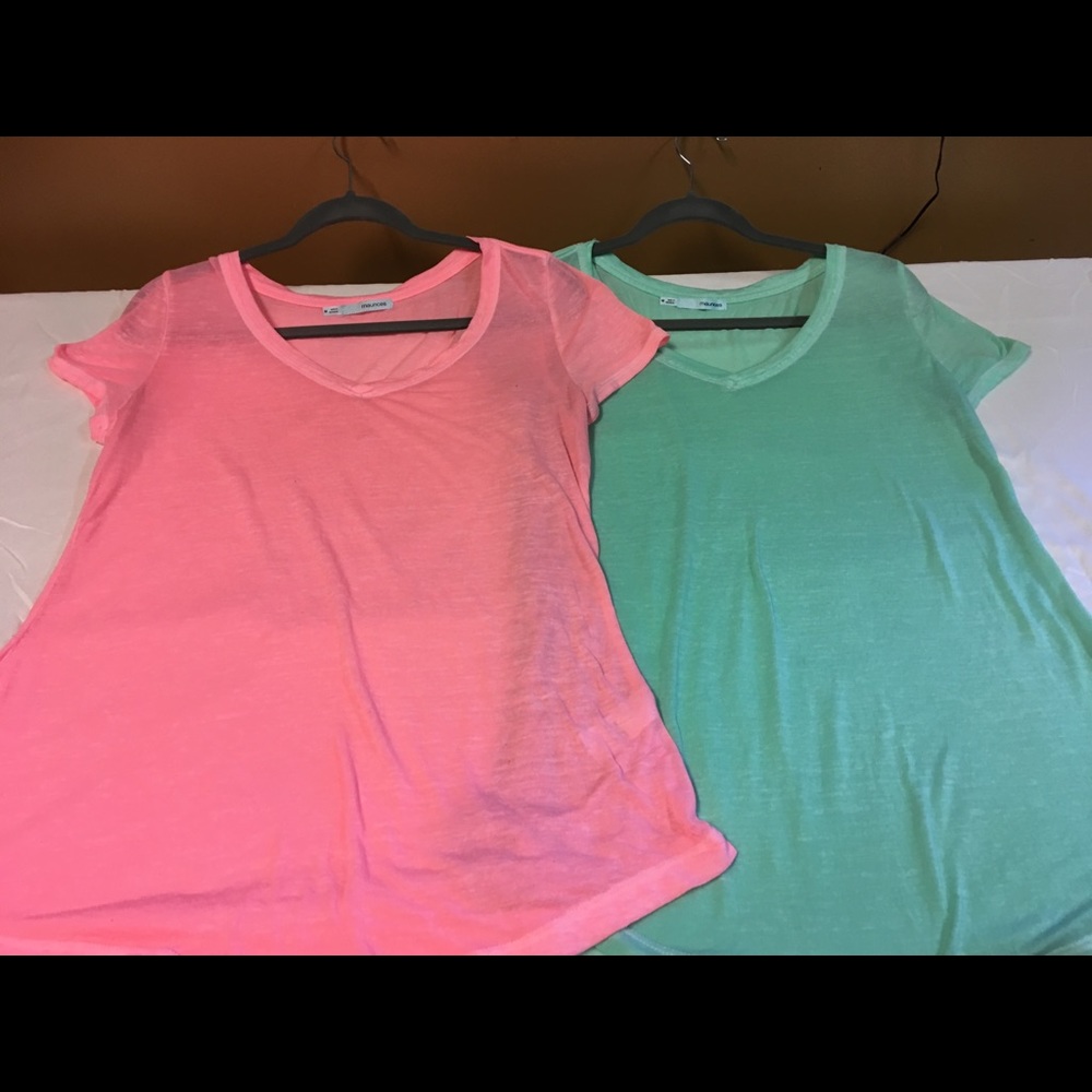 Two Maurice tee shirts